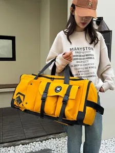 Large capacity yellow travel duffel bag, versatile gym and yoga bag for women commuting.