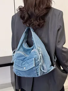 Stylish denim backpack for women, multi-pocket casual shoulder bag and commuter crossbody bag.
