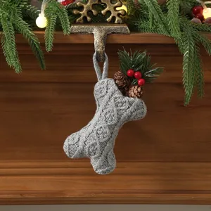 Grey cable knit bone Christmas stocking ornament, detailed close-up shot for holiday decor.