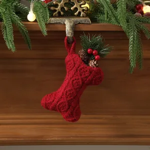 Red knit bone Christmas stocking hanging decor with pine cones for holiday fireplace tree display