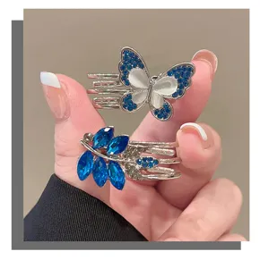 Sweet butterfly and leaf hair clips with blue rhinestones, elegant side bang accessories.