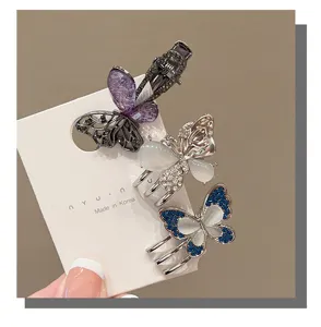 Detailed shot of sparkling butterfly hair clips, elegant side bangs clip and hair accessories.