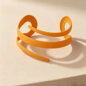 Minimalist orange spiral cuff bracelet, unique candy-colored modern design fashion jewelry