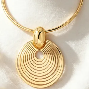 Exquisite gold metal concentric circle choker necklace, vintage fashion statement jewelry.