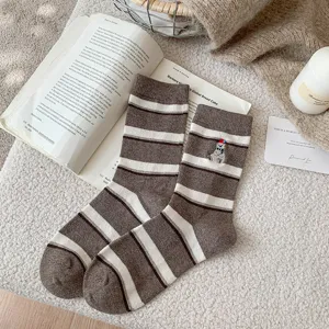 Cozy winter cashmere socks with cute polar bear embroidery, vintage stripes, warm and soft wool.