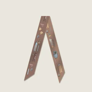 Chic brown long narrow silk twilly scarf with vintage stationery print for bag handle and hair styling.