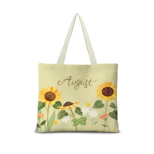 Vue détaillée du sac cabas en toile florale esthétique avec impression de tournesol.