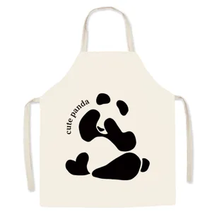 Minimalist cute panda kitchen apron detail, beige cotton fabric with black graphic print.