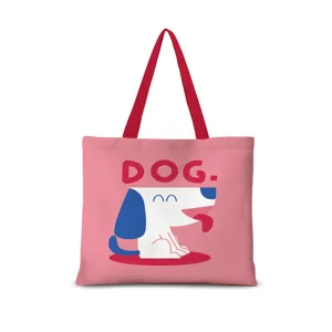 Détail de sac cabas en toile rose avec illustration de chien et design imprimé.