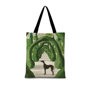 Vue détaillée d'un sac cabas en toile rétro littéraire avec une illustration de jardin artistique.