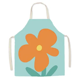 Cute floral kitchen apron detail, light blue fabric with orange flower pattern, clean design.