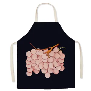 Black fabric kitchen apron featuring a cute pink grape print, perfect for baking and cooking.