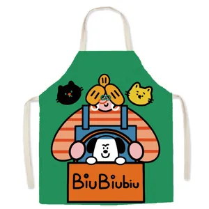 Cartoon puppy linen apron detail shot, creative quirky cooking smock for home kitchen studio.