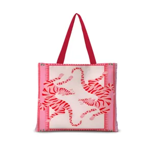 Sac cabas en toile stylise avec motif de tigre rose et poignees rouges pour femmes.