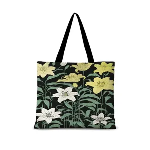 Grand sac cabas en toile botanique artistique avec un bel imprimé de lys jaunes et blancs.