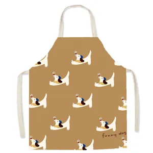 Close-up detail of cute cartoon dog pattern kitchen apron fabric, showing clear print quality.