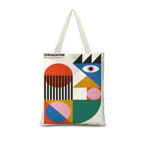 Vue détaillée du sac cabas en toile à art géométrique dopamine, grand sac à épaule pratique.