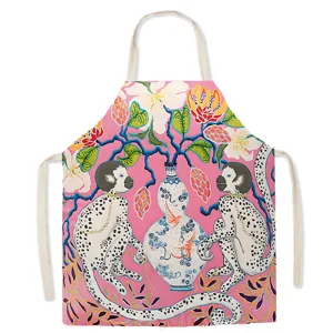 Detailed close-up view of the vintage animal and floral print design on this kitchen apron.
