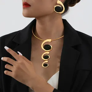 Gold-tone metal spiral statement choker necklace and matching stud earrings jewelry set.