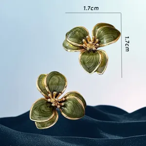 Vintage green flower earrings with a unique elegant design, ideal for chic daily wear outfits.