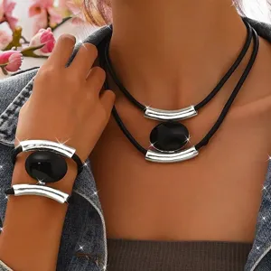 Retro multi-layer black stone necklace and bracelet set with silver metal tubes for women.
