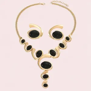 Gold-tone spiral black stone necklace earrings set, vintage fashion jewelry for women.