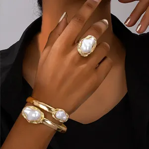 Gold irregular baroque imitation pearl ring bracelet set fashion vintage jewelry detail shot