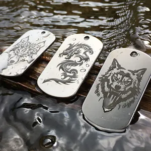 Stainless steel custom dog tags with laser engraved wolf and dragon motifs for pet and necklace.