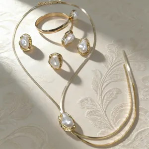 French vintage baroque pearl gold jewelry set necklace ring earrings detail view chic fashion