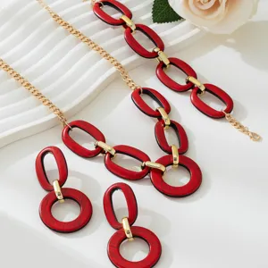 Detail shot of a vintage red wood grain geometric chain necklace and matching earrings set.