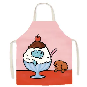 Close-up detail of cute cotton kitchen apron featuring sweet ice cream and lovely puppy art.