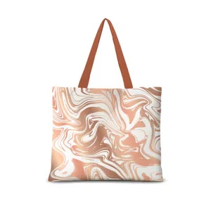 Sac cabas en toile élégant doté d'un joli motif marbré abstrait en or rose et blanc.