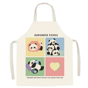 Cute dopamine panda print detail on beige cotton apron, perfect for kitchen cooking.