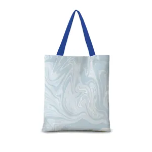 Sac cabas en toile de coton avec motif marbré bleu élégant et anses solides pour un usage quotidien.