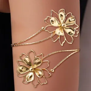 Gold hollow flower upper arm cuff detail, chic fashion body jewelry for women daily wear.