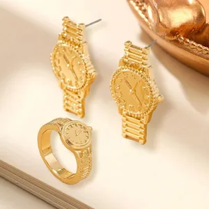 Gold watch shaped jewelry set earrings ring minimalist fashion design luxury style chic accessory