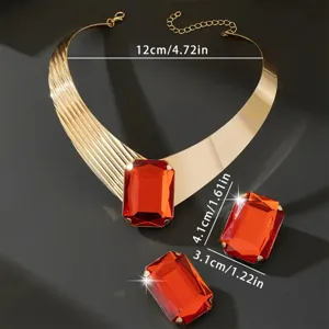 Exaggerated gold choker necklace and large red gemstone stud earrings set for women banquet.