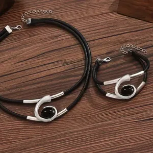 Bohemian spiral acrylic gemstone jewelry set for women, featuring necklace and bracelet.