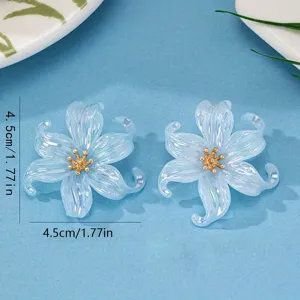 Pair of translucent iridescent acrylic flower earrings for women, stylish and chic fashion jewelry.