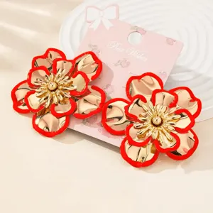 Korean style stylish large flower earrings with striking red rims and gold metallic finish.
