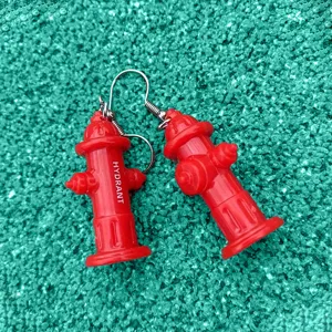 Mini red fire hydrant drop earrings, creative 3D novelty fashion jewelry for daily wear.