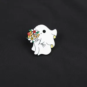 Cute ghost enamel pin detail showing white ghost figure holding colorful rhinestone flower bouquet.