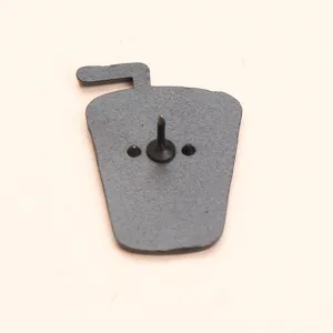 Detail of the metal lapel pin back, displaying secure metal clasp and sturdy needle construction.