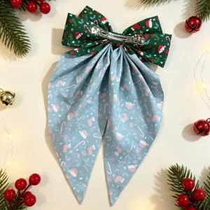 Joli nœud papillon de Noël pour cheveux avec imprimé festif et pince solide.
