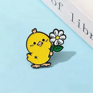 Cute yellow chick holding daisy brooch, alloy enamel lapel pin badge for clothes and bags.