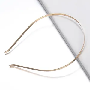 Close-up details of the slim gold metal hair hoop, ideal for DIY crafts and daily wear.