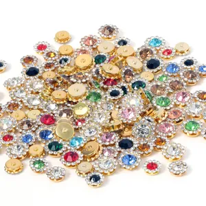 Detailed shot of multi-colored rhinestone flower buttons, DIY craft hair accessory charms.