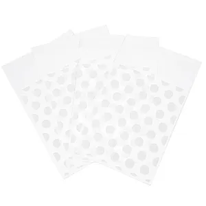 Sachets scellables adhésifs en plastique transparent à pois blancs pour emballage de bijoux.