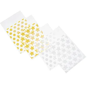 Sachets d'emballage en plastique adhésifs avec étoiles dorées et blanches pour les détails.