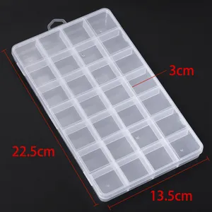 Detailed view of the clear plastic organizer box with multiple adjustable compartments.